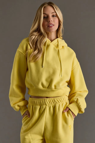 Women’s relaxed fit pullover hoodie with drawstring hood and long sleeves