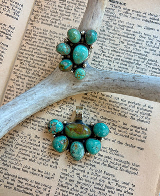 Handcrafted adjustable genuine turquoise cluster ring with natural turquoise stones on an antique silver alloy band.