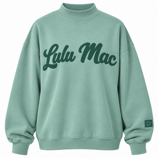 Sage green Lulu Mac mock neck top with dark green script lettering.
