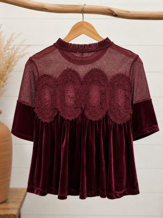 Back of burgundy velvet babydoll top with sheer mesh and lace detailing