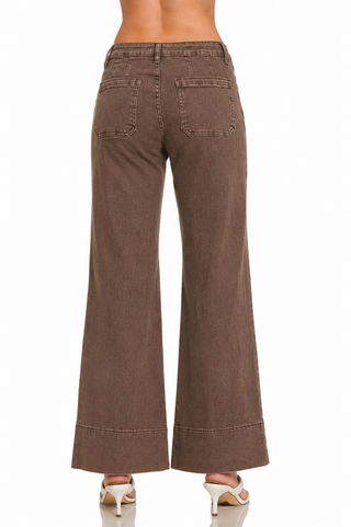 Back view of brown mid rise wide leg jeans with patch pockets and wide hem
