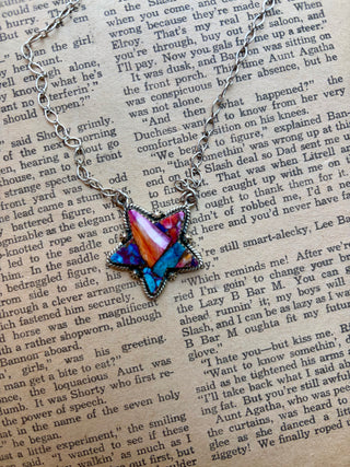 Sterling silver star necklace featuring colorful Pink Dahlia stone inlay in pink, turquoise, orange and blue tones.