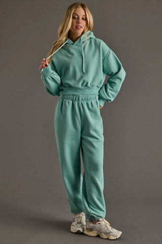 Women’s relaxed fit pullover hoodie with drawstring hood and long sleeves