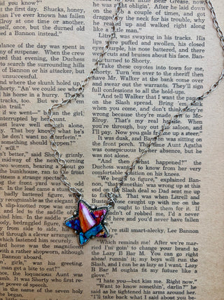 Sterling silver star necklace featuring colorful Pink Dahlia stone inlay in pink, turquoise, orange and blue tones.
