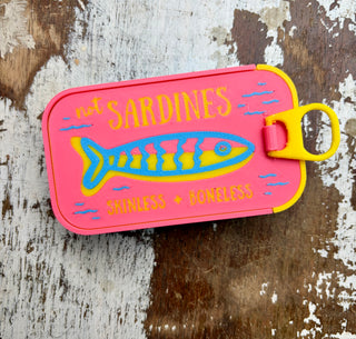 Colorful sardine tin travel jewelry organizers in assorted colors
