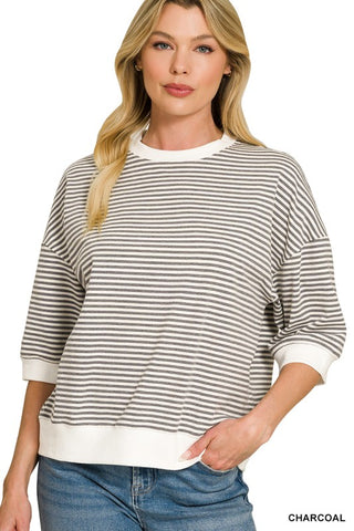 Women’s relaxed fit striped knit top with short sleeves, ribbed trim, and a crew neckline