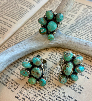 Handcrafted adjustable genuine turquoise cluster ring with natural turquoise stones on an antique silver alloy band.