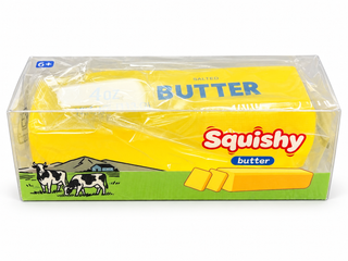 Maltose Butter Squishy in a yellow butter-themed package with cow illustrations, shown against a white background.
