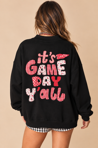 Back view of black oversized sweatshirt with red pink and white It’s Game Day Y’all graphic