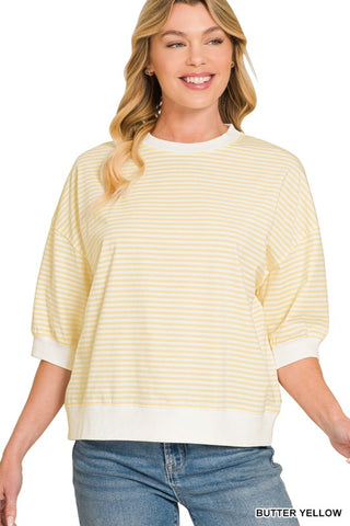 Women’s relaxed fit striped knit top with short sleeves, ribbed trim, and a crew neckline.